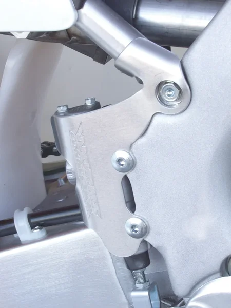 WORKS Rear Master Cylinder Guard - Durable Protection for Powersports Vehicles